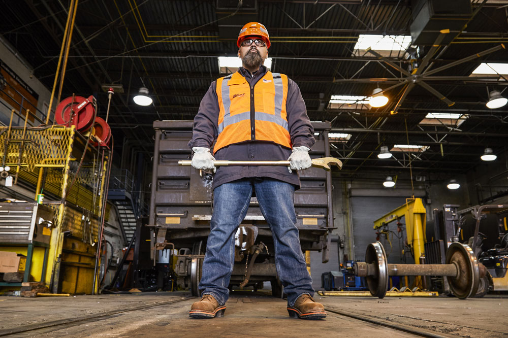 A man wearing the Thunderstruck 10” Waterproof Nano Comp Toe boots in brown.